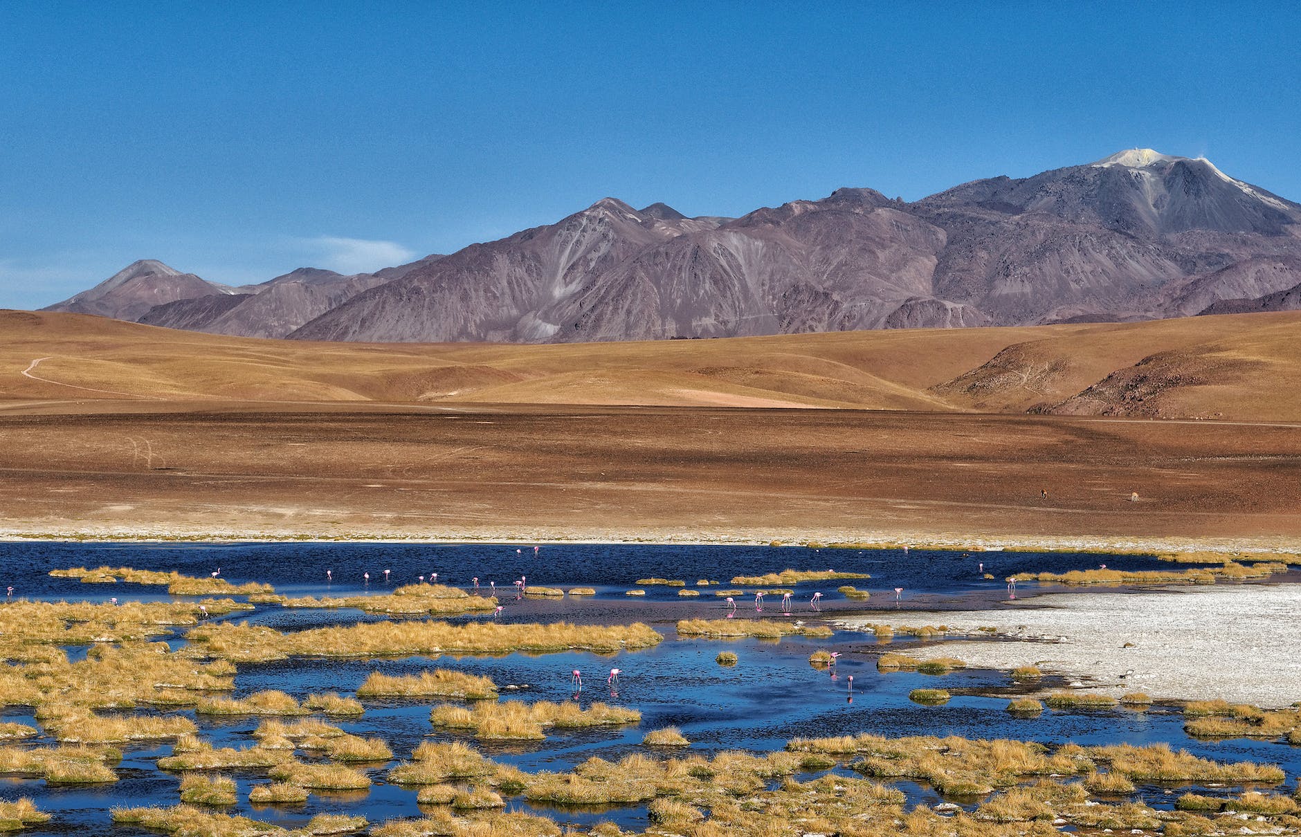 brown mountains under the blue sky